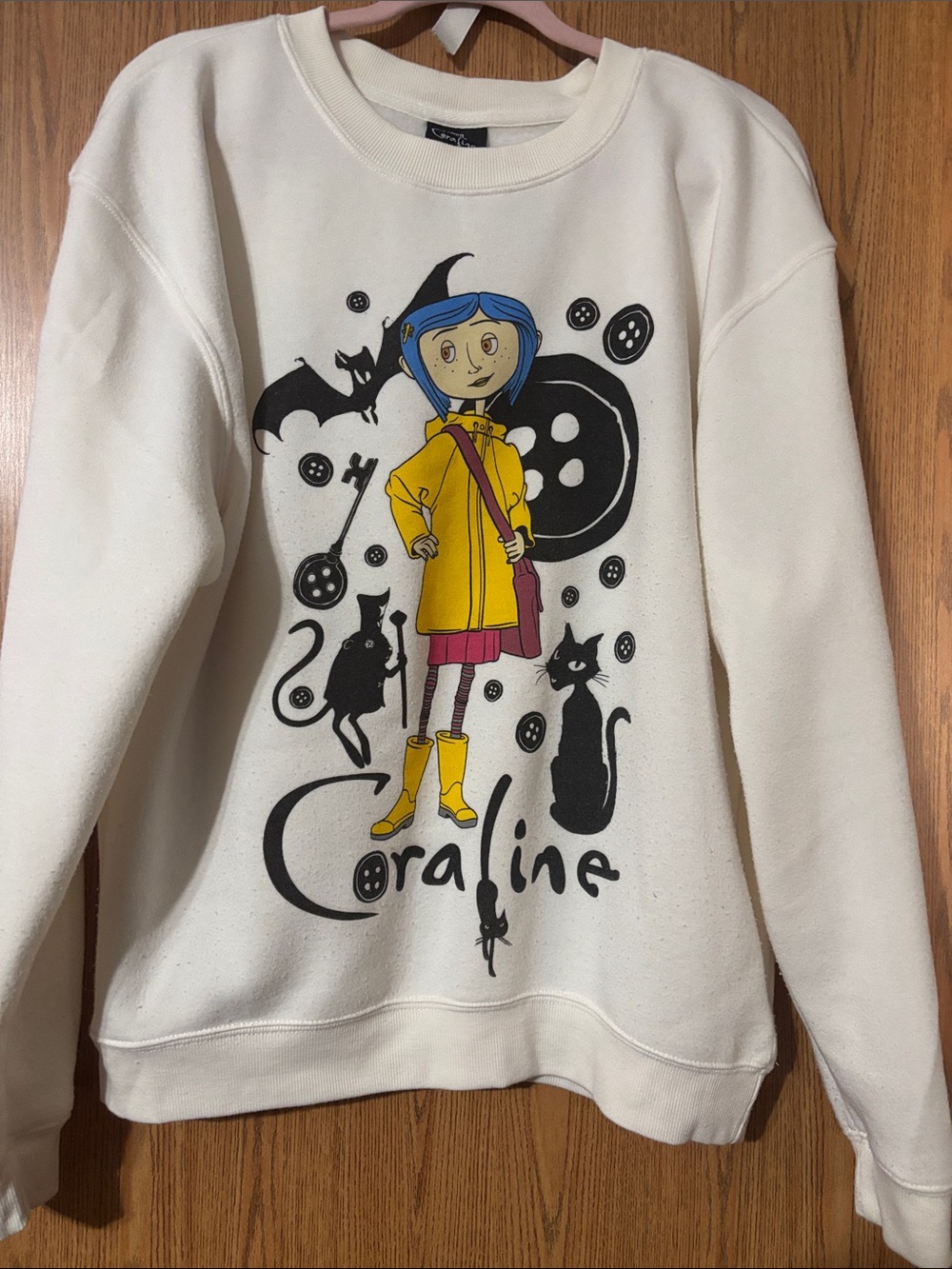 Cream Coraline Graphic Crewneck Sweatshirt with Yellow Accent